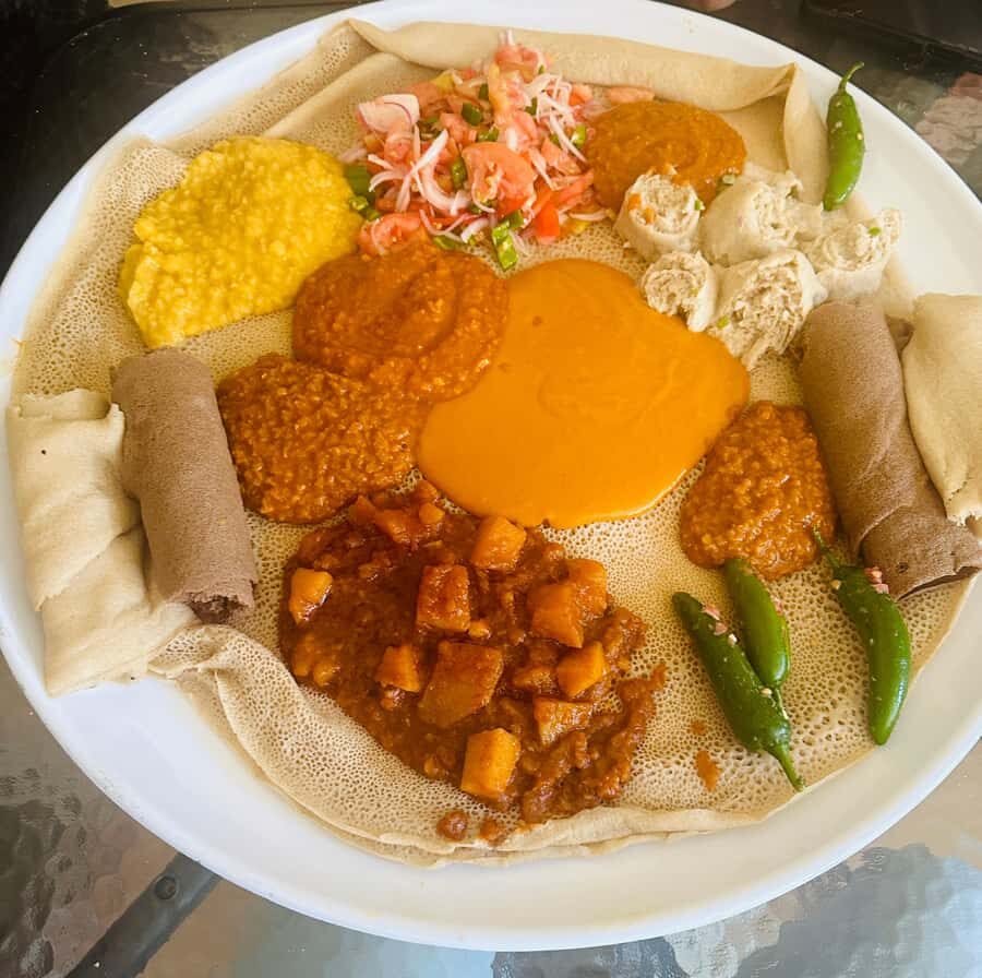 Addis Ababa city tour from Bole airport and All Hotels - Shiromeda Market: shopping culture with traditional clothing at the center