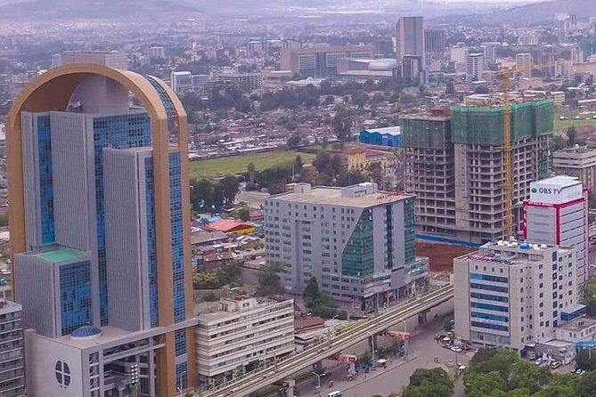 Airport Layover Tour | Half Day Addis City Tour : sightseeing, museum , markets - Mercato Market: shopping time that feels like a real Addis day