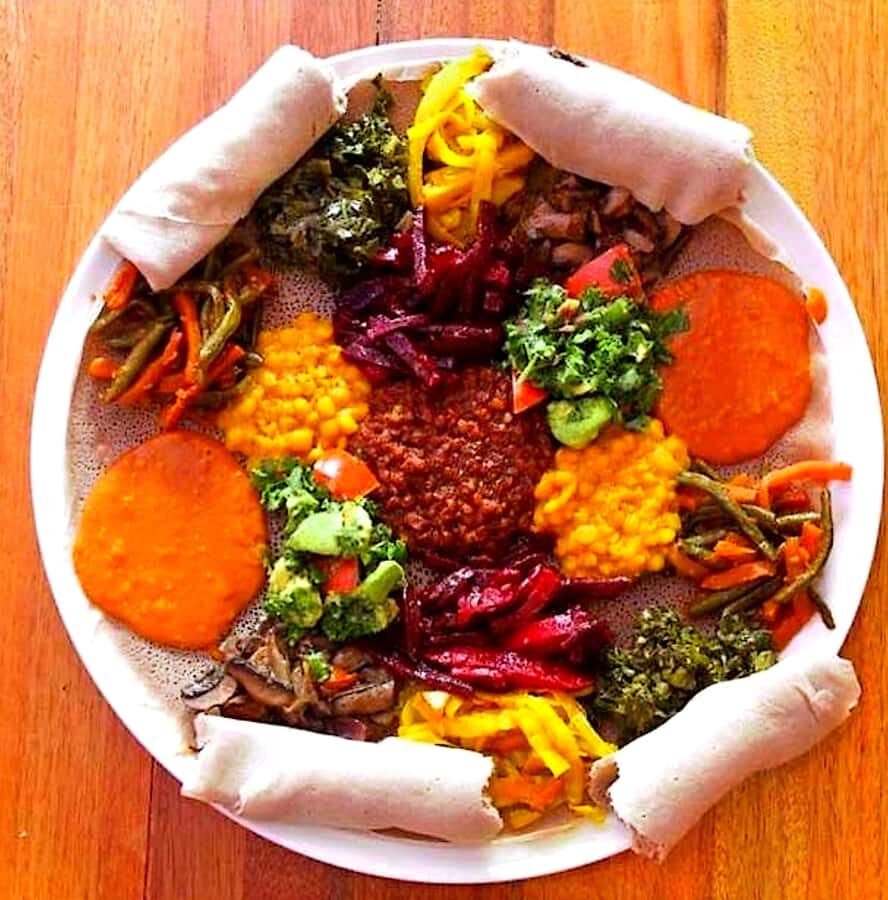 Food tour in Addis Ababa with airport pick-up. - Lunch that gives you the Ethiopian flavor map: beyaynetu + shiro wot