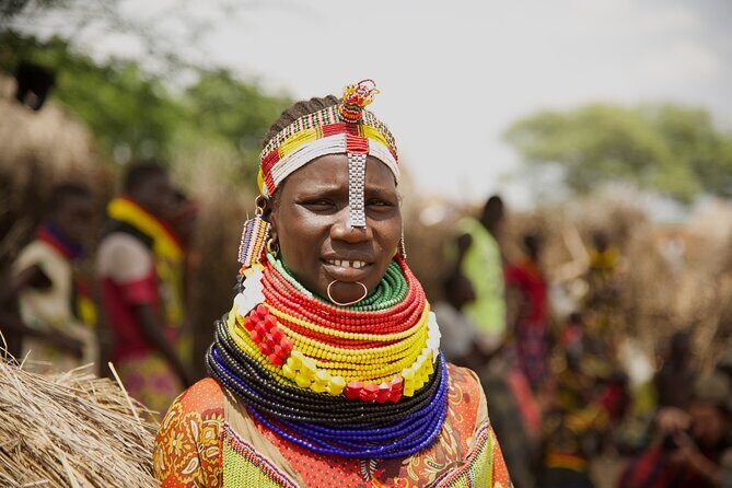 Photography Expeditions to Omo Valley - Omorate and the Dassanech canoe crossing: hair buns and river life